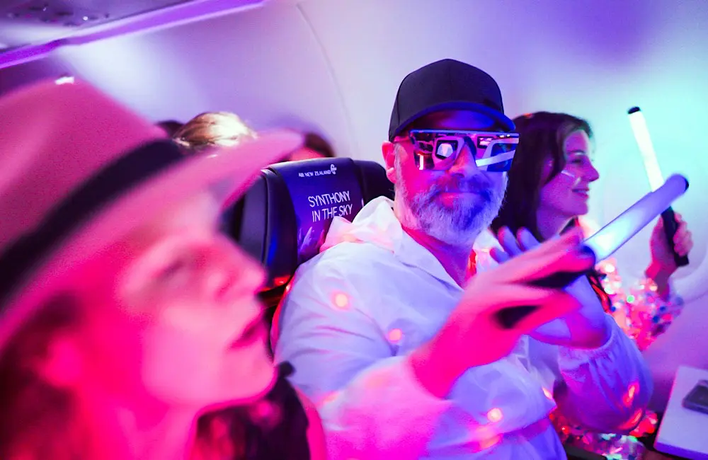 Synthony in the sky: Air New Zealand sells out mid-air concert flight 2 Air New Zealand’s cabin becomes a live music venue at 30,000 feet for the one-off SYNTHONY in the Sky Tasman crossing.