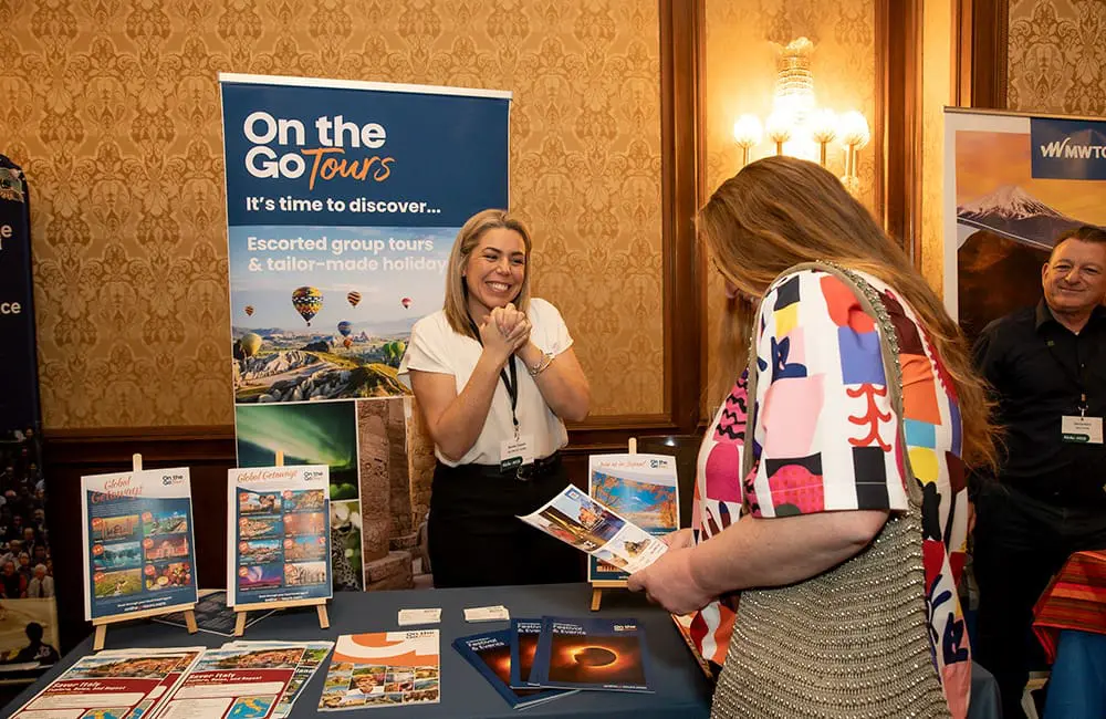 On The Go Tours booth at Niche is Nice 2025 in Melbourne.