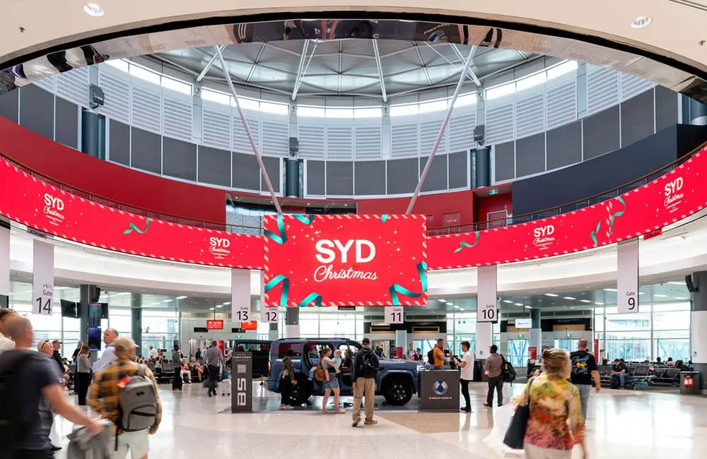 First stage of new T3 dining precinct opens as Sydney Airport predicts record festive season 3 Christmas SYD 2025 signage at Sydney Airport.