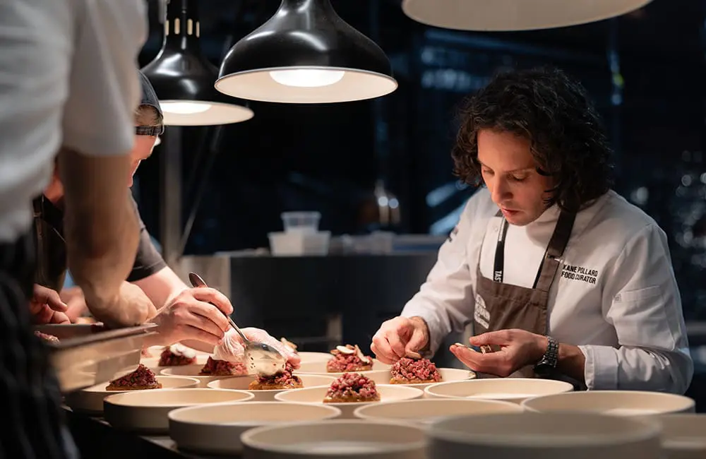 Chef plating food in Adelaide Hills. Image: Tasting Australia