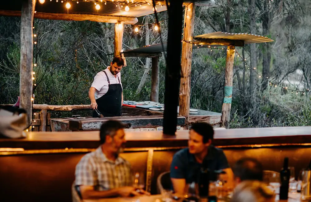 Chef cooking outdoors on the Eyre Peninsula, South Australia. Image: Tasting Australia