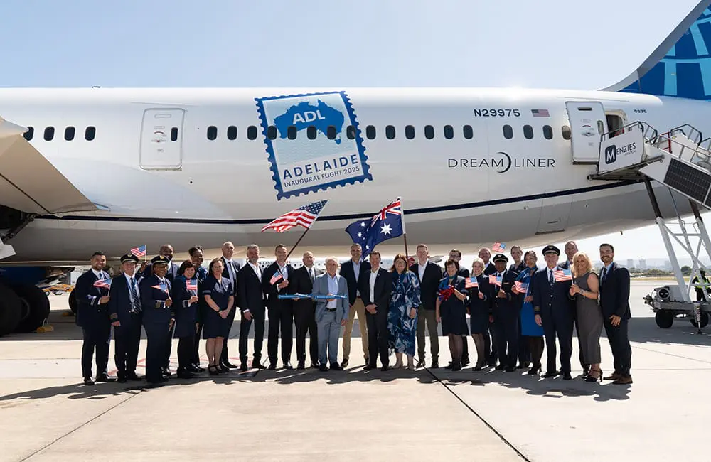 Touchdown! First-ever direct Adelaide-USA flights take off with United Airlines 3 Tourism and aviation execs plus United Airlines crew in front of aircraft on the inaugural ADL-SFO flight.