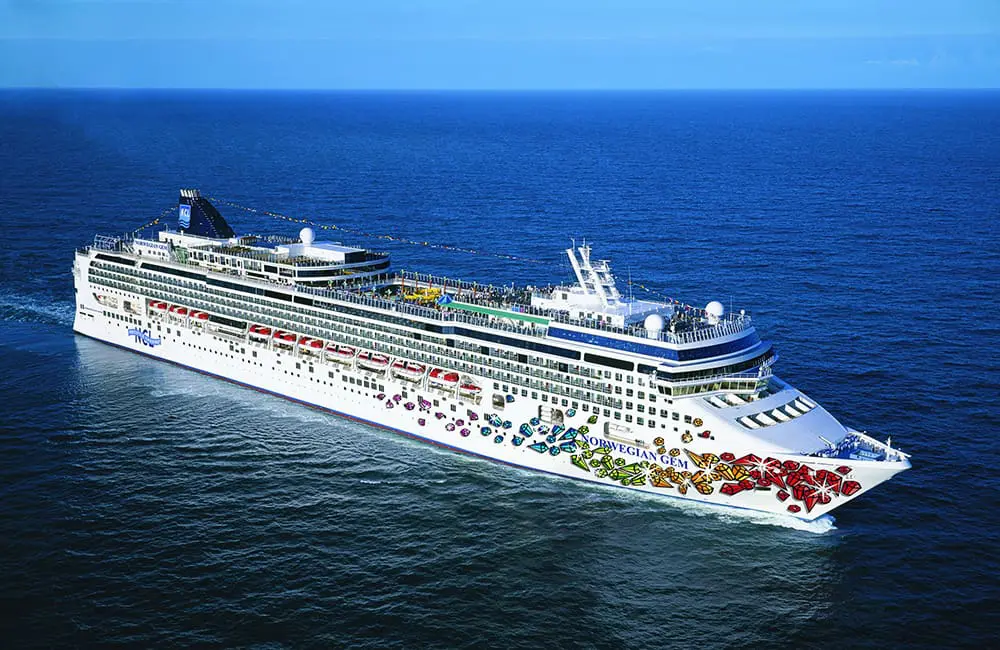 Grown-up vibes: NCL unveils adults-only glow-up for two more ships by May 2026 2 Aerial image of Norwegian Gem at sea. Image: NCL