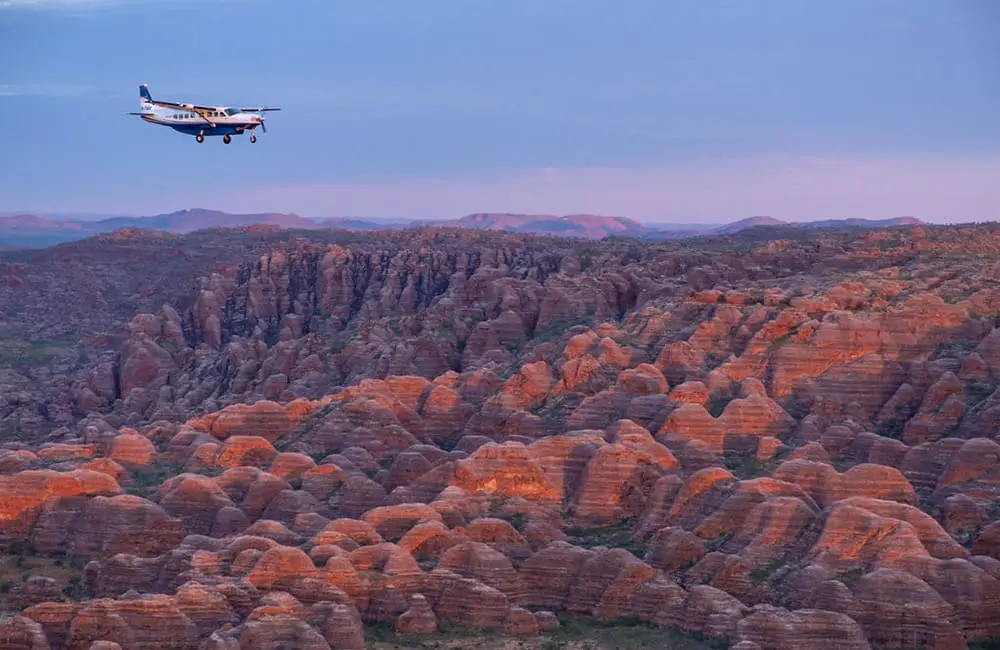 Take a scenic flight over the Bungle Bungles in the Kimberley. Image: Aviair