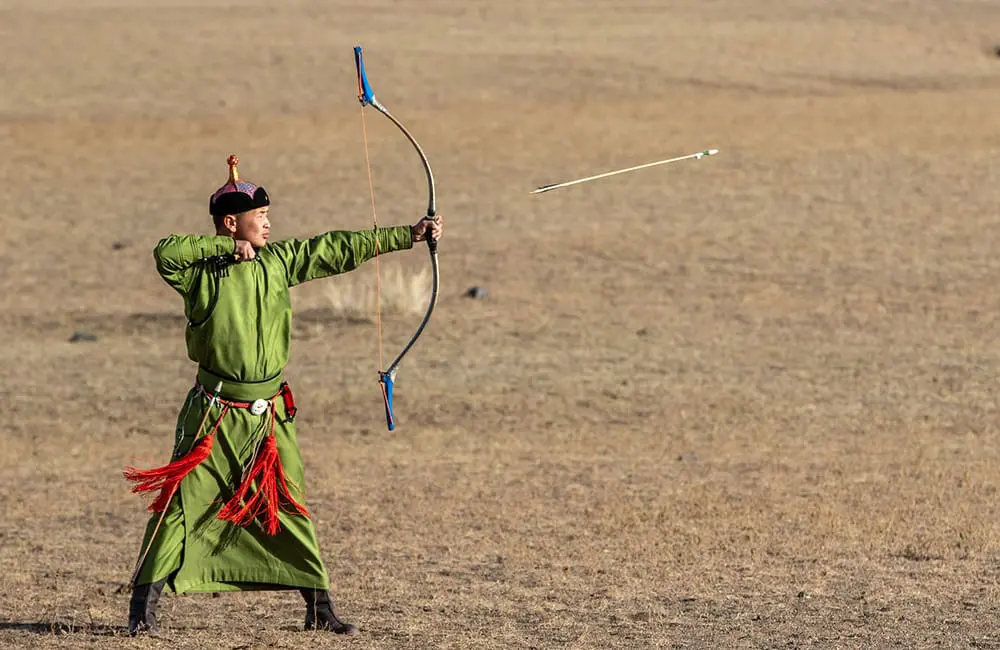 Traditional archer at Naadam Festival in Mongolia. A&K Worldwide Sale