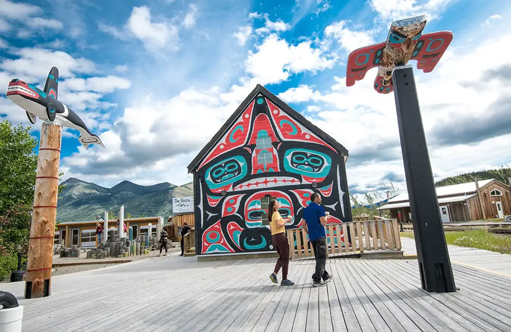 Tourists outside a cultural centre in Yukon Territory, Canada. Image: ITAC