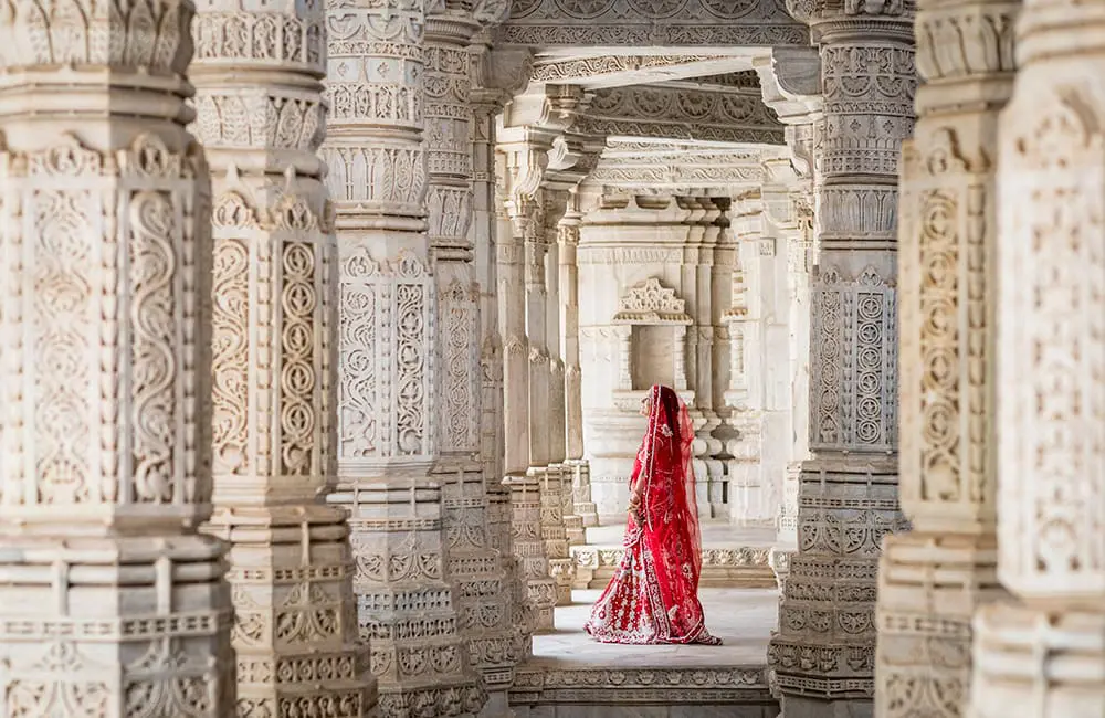 Women lead the way: Inspiring Vacations rolls out 5 female-focused small-group tours in Asia 2 Woman in sari at Ranakpur Jain temple in India. Image: Getty Images – Inspiring Vacations Inspired Women small-group tours