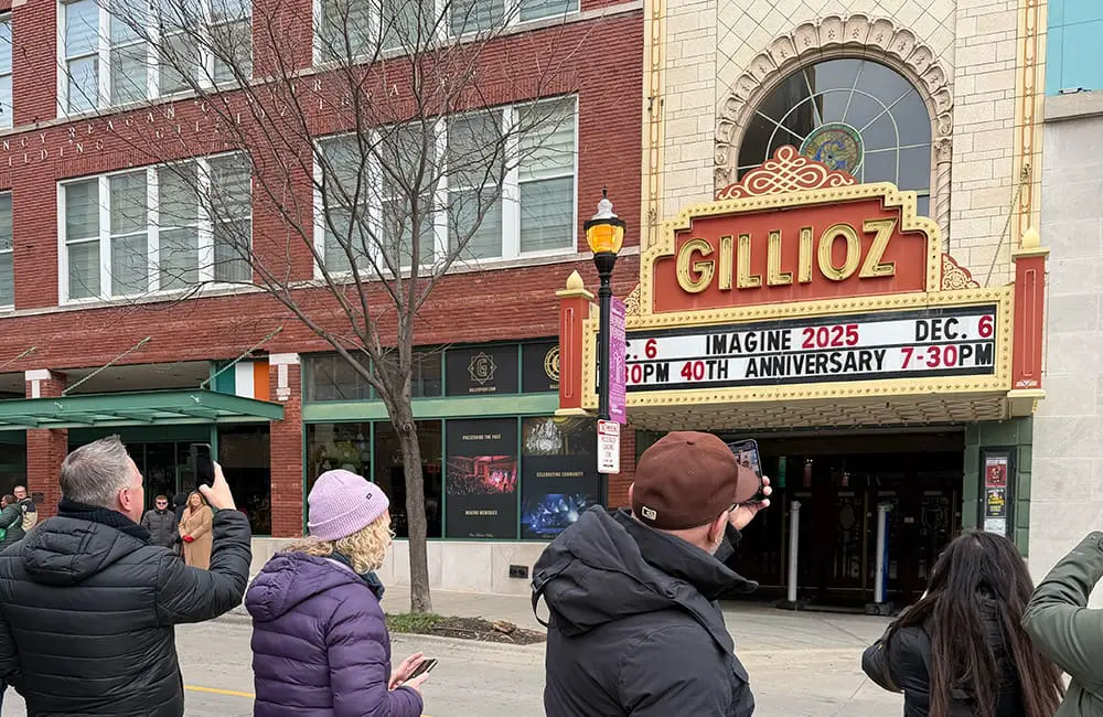 Tour group taking photos of the Gillioz Theatre exterior in Springfield, Missouri. Image: Cassie Tannenberg