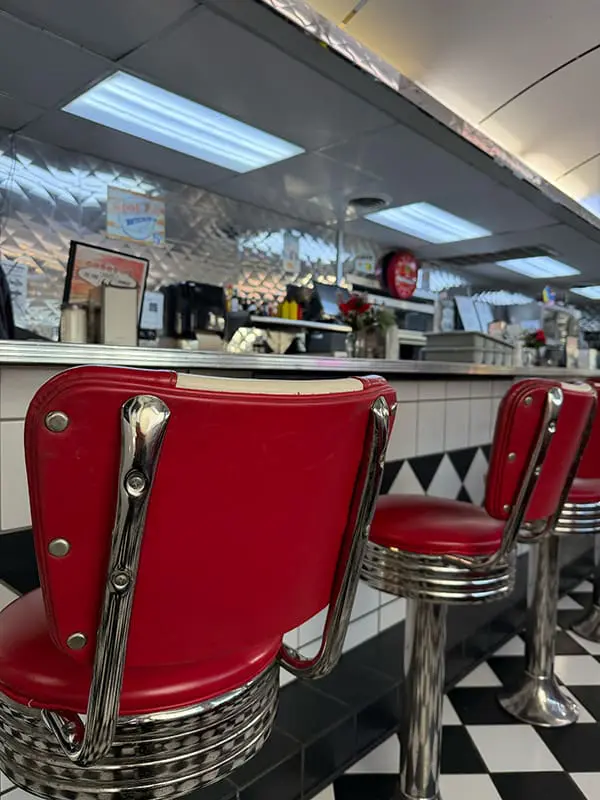 Classic chairs at the counter at the Route 66 Diner. Image: Cassie Tannenberg