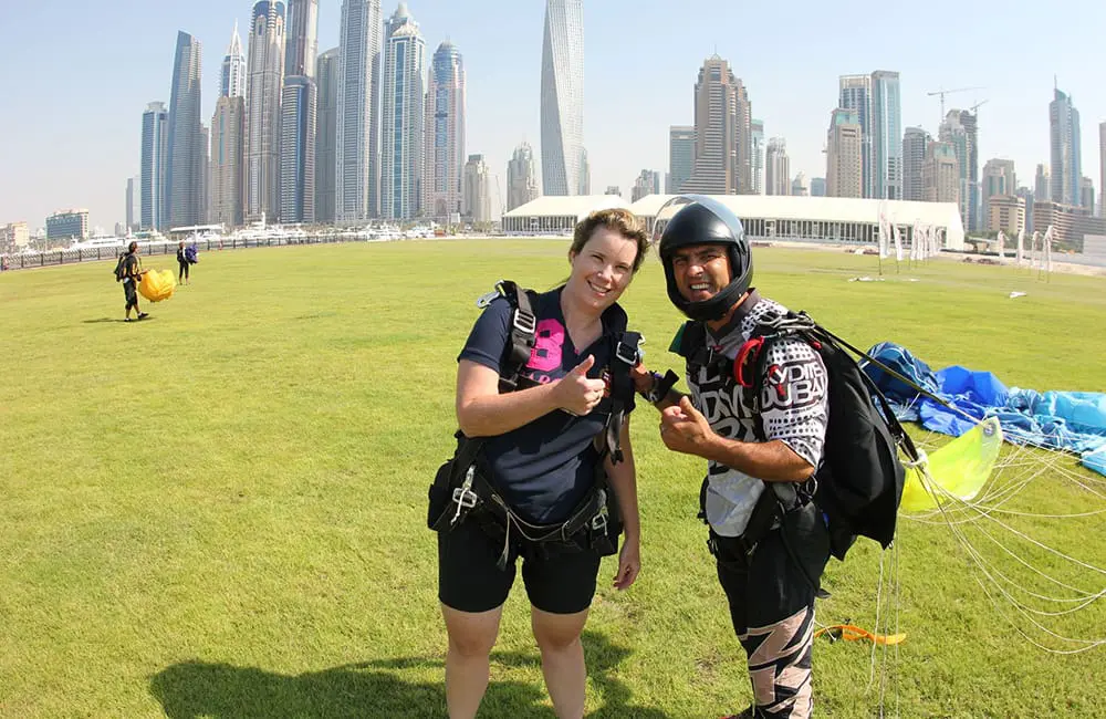 MTA travel advisor Catherine Kimberley with skydiver on tandem skydiving experience in Dubai.