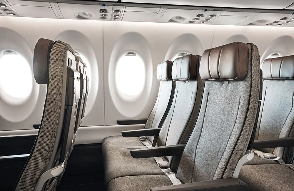 Close-up of QantasLink A220 Economy seats.