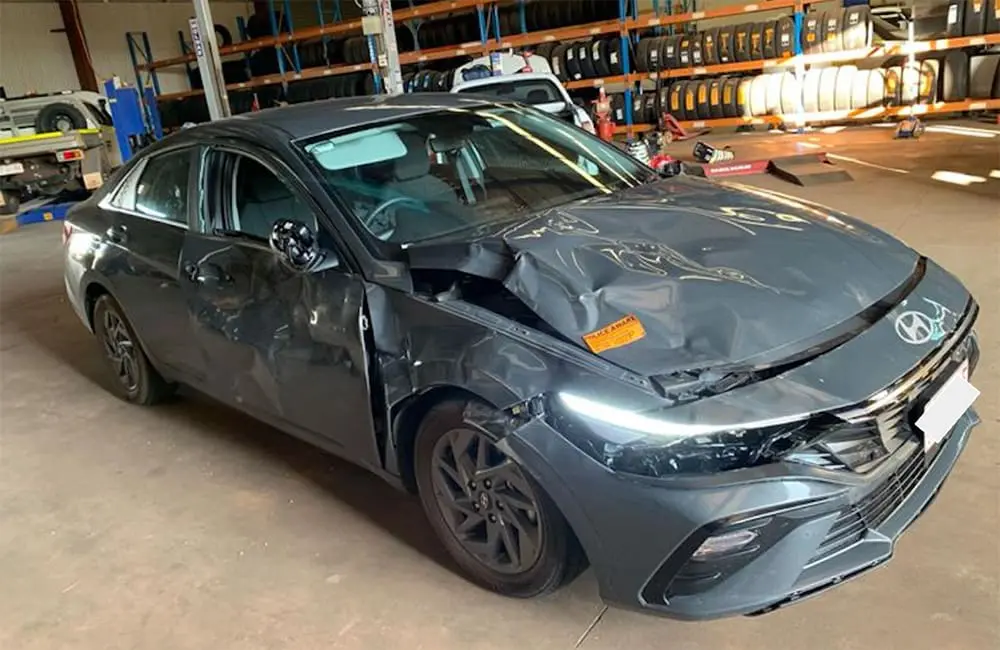 Damaged hire car due to a buffalo running into it at the workshop. Image: SCTI domestic travel claims in 2025