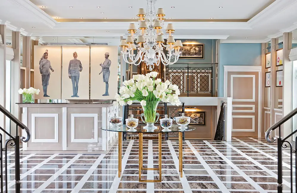 Render of lobby on board Trafalgar Harmonie.