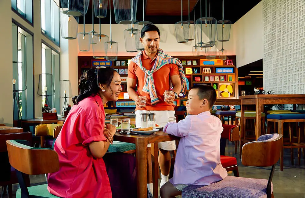 Family at Wink hotel space in Vietnam