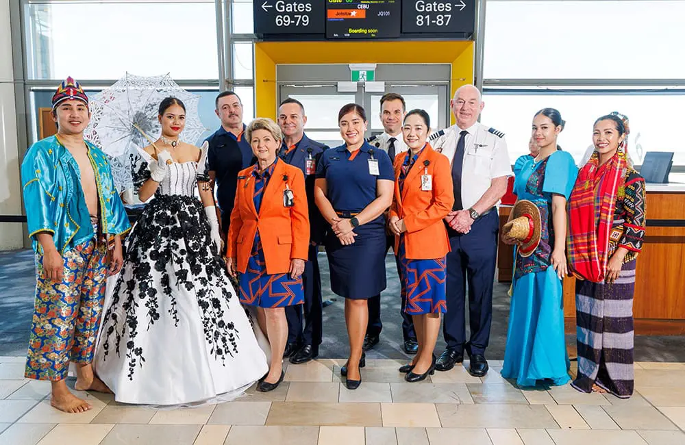 Jetstar and Brisbane Airport staff at Cebu launch at BNE International Terminal gate.  Image: J&A Photography/Josh Woning