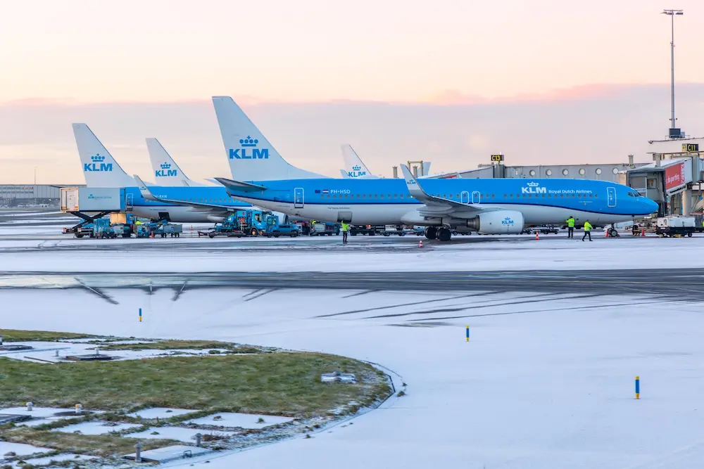 Snowed under: Hundreds of flights cancelled as Europe’s cold snap bites 1 KLM planes at Amsterdam's Schiphol Airport in 2024.