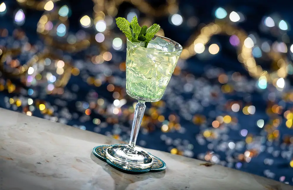 Absinthe frappé on Disney Adventure, part of the themed dining experiences on board.