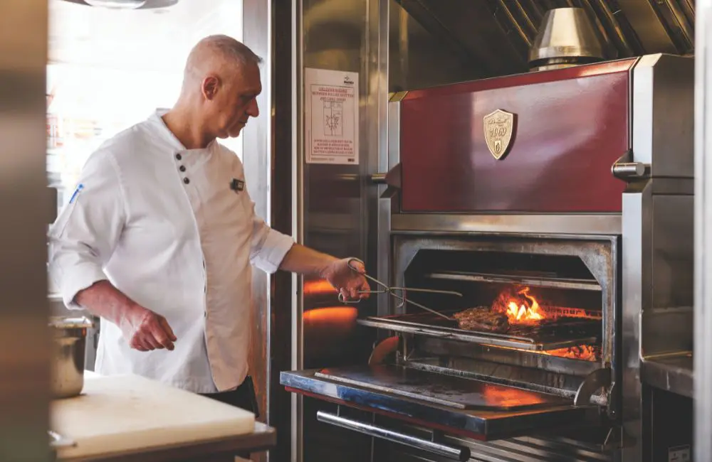 At night the poolside 7AFT Grill transforms into an al fresco chophouse, featuring the Josper Grill