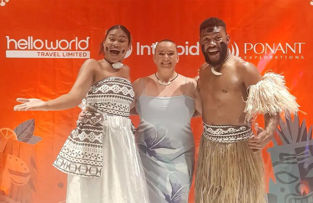 Karma Clark (centre) at the 2025 Helloworld Frontliners Conference in Fiji.