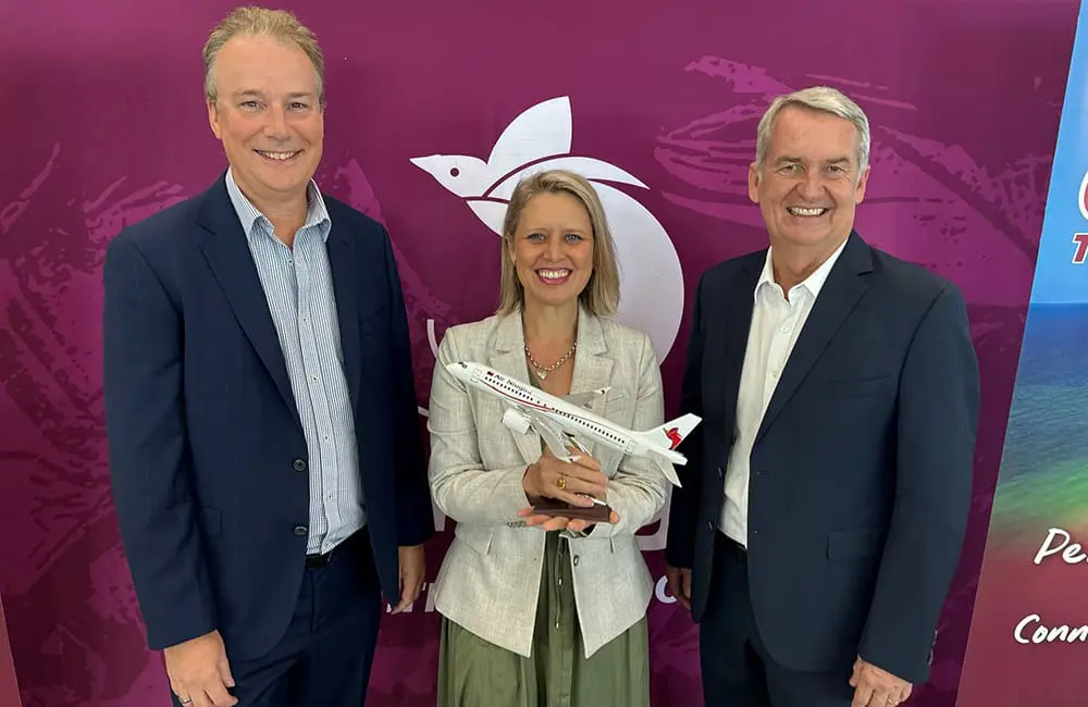 Cairns Airport Head of Airline Partnerships David Nye, Queensland Assistant Tourism Minister Bree James and Air Niugini CEO Alan Milne celebrated the arrival of the A220 aircraft to Cairns. Image: Bang Media