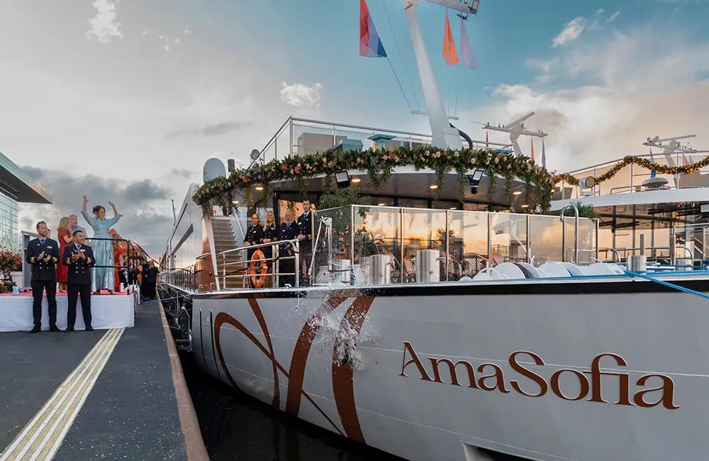 AmaSofia godmother and US travel agent Sarah Little christens the ship with Champagne.