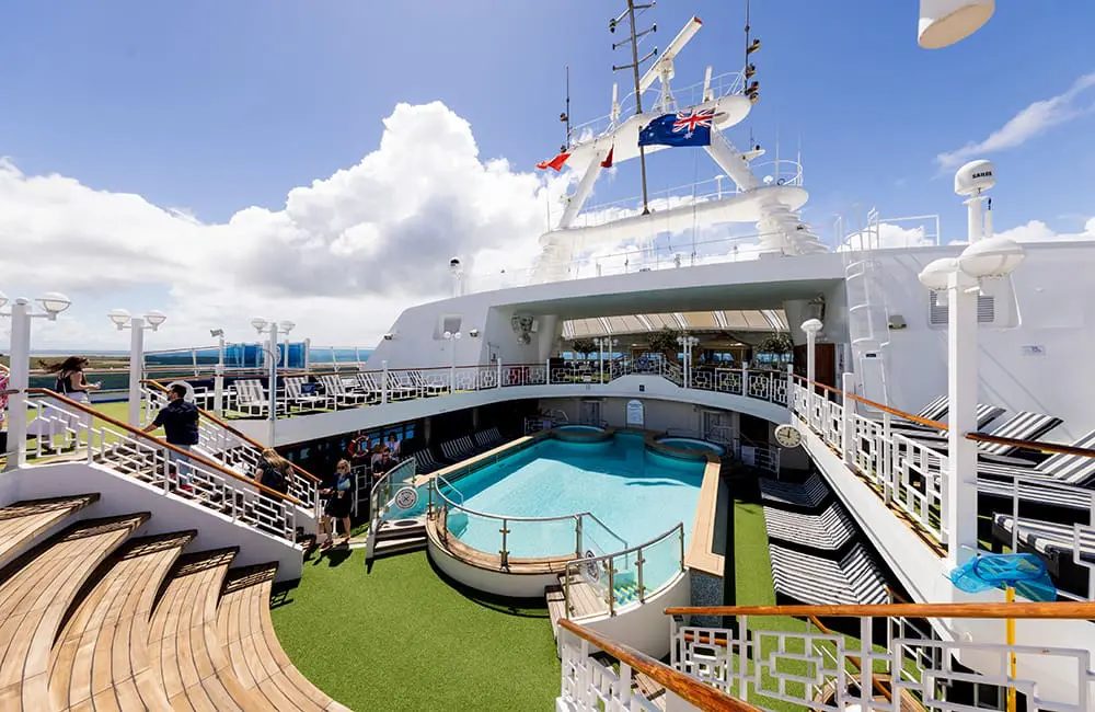 Pool area with hot tubs on board Carnival Encounter.