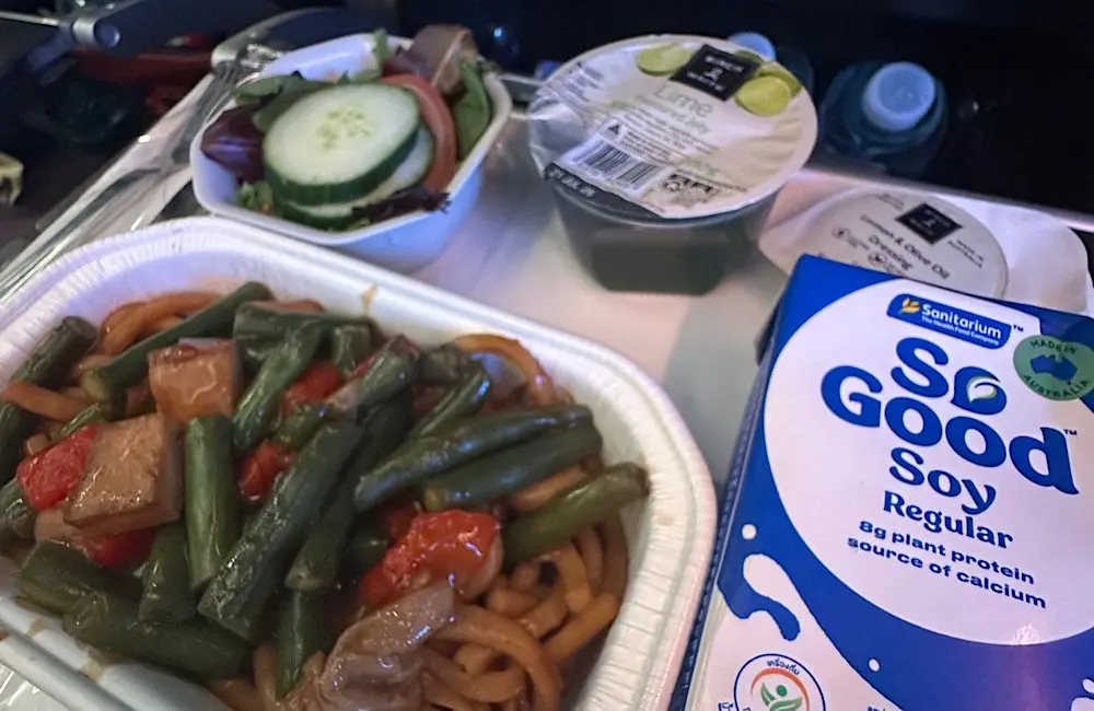 In-flight meal service on Japan Airlines from Sydney.