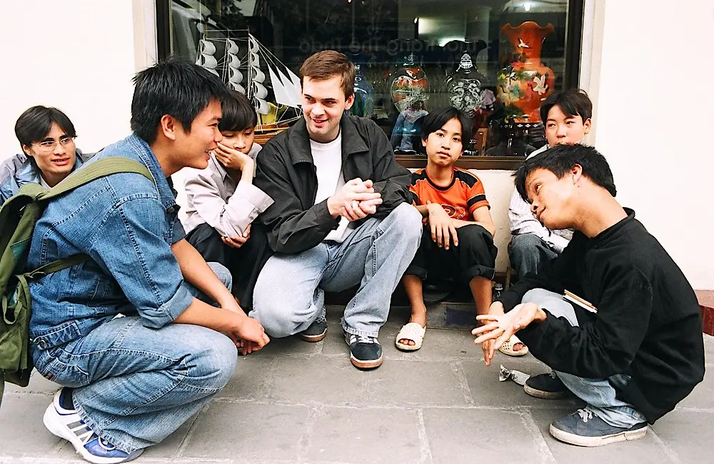 Blue Dragon founder Michael with co-founder Chung and street kids, 2003
