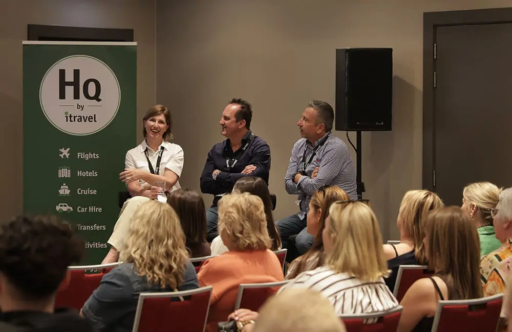 itravel National BDM Jo Howard, COO Joe Karbo & CEO Steve Labroski on stage at the itravel 2026 Elevate Conference