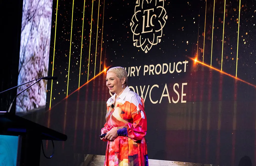 LTC GM Nikki Glading presents on stage at the Luxury Product Showcase.