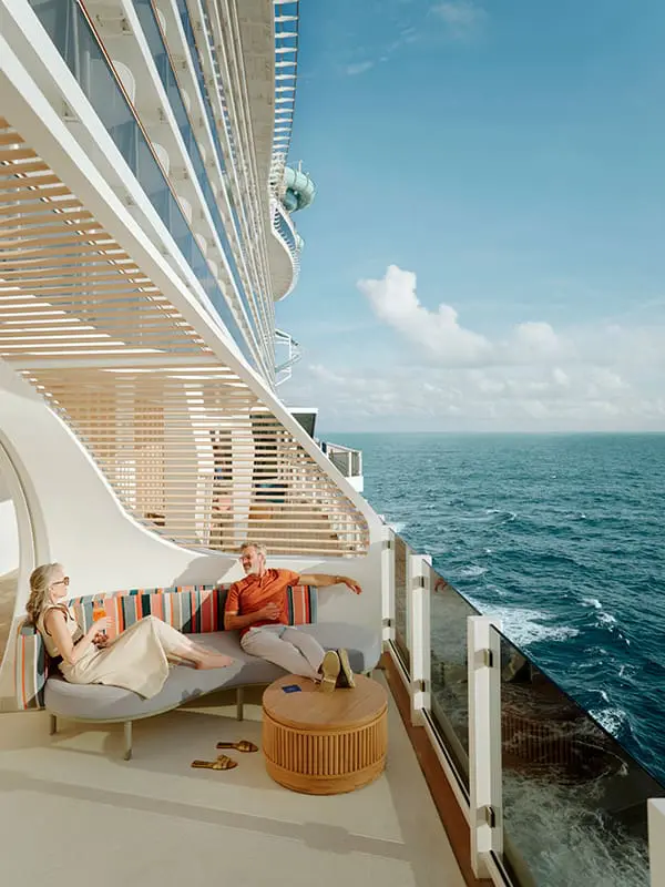 Couple sitting at La Terrazza on Norwegian Aqua cruise ship at sea – NCL Just Cruise fare intro