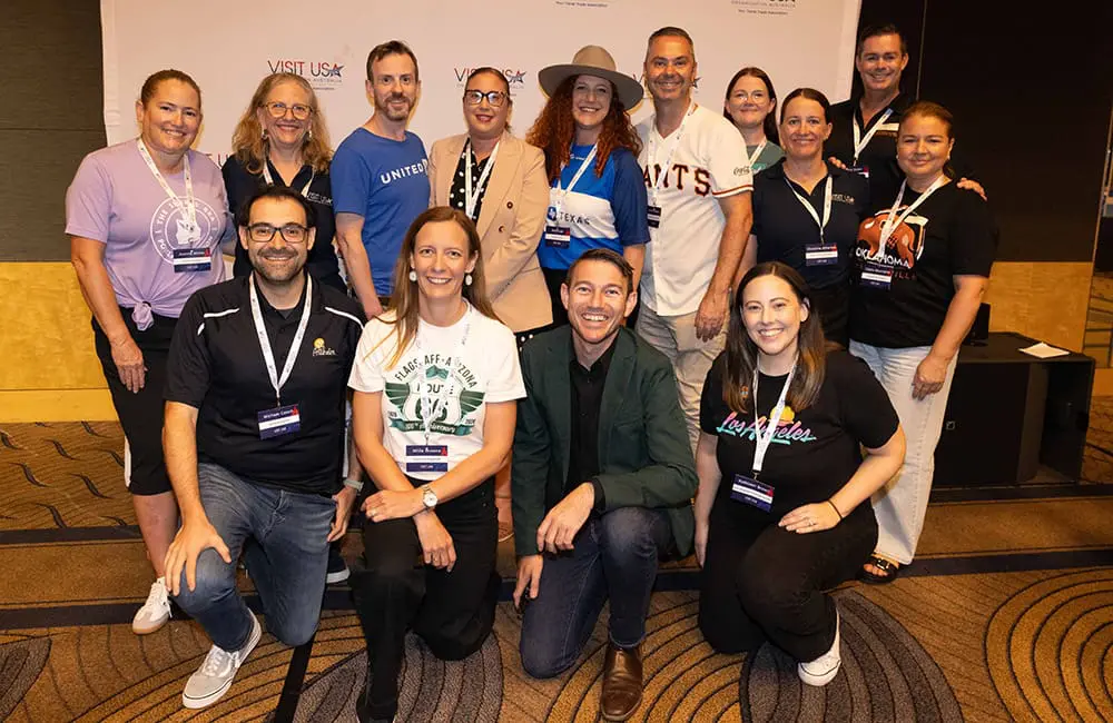 2026 Visit USA Australia Executive Committee. Back (L-R): Joanne Motta, Aida Osta, Richard Carrick, Belinda Harvy, Anne Lee, David McMahon, Mel Newton, Tony Soden, Christina Atherton & Claire Mountaine. Front (L-R): Michael Cassis, Millie Browne, Chris Watson & Kathleen Brown. 