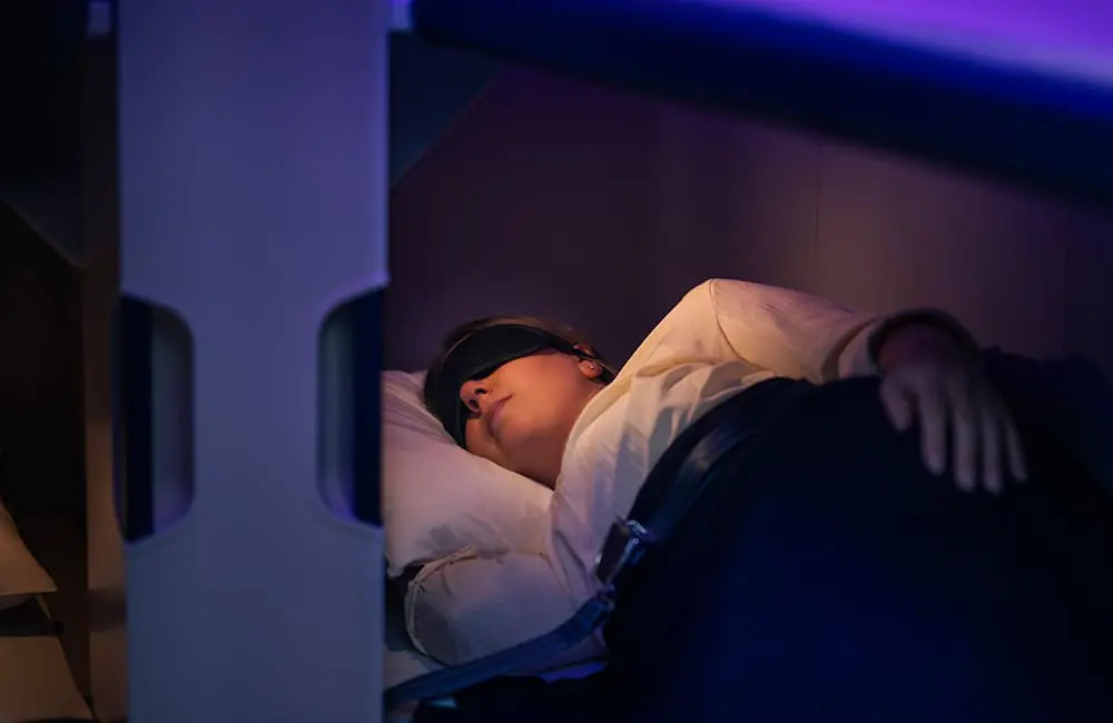 4-hour nap for $495: Air New Zealand’s innovative Economy Skynest sleep pods on sale from 18 May 4 Passenger asleep in Air New Zealand Economy Skynest sleep pods.