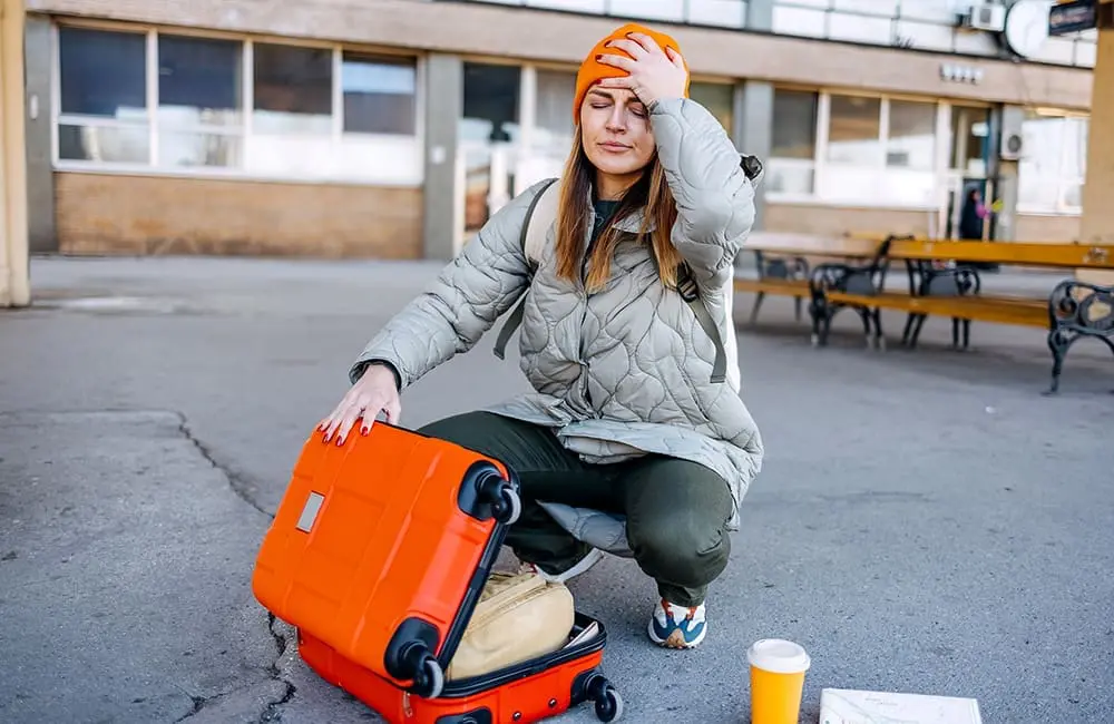 Looking for lost luggage contents. Image: StefaNikolic/iStock