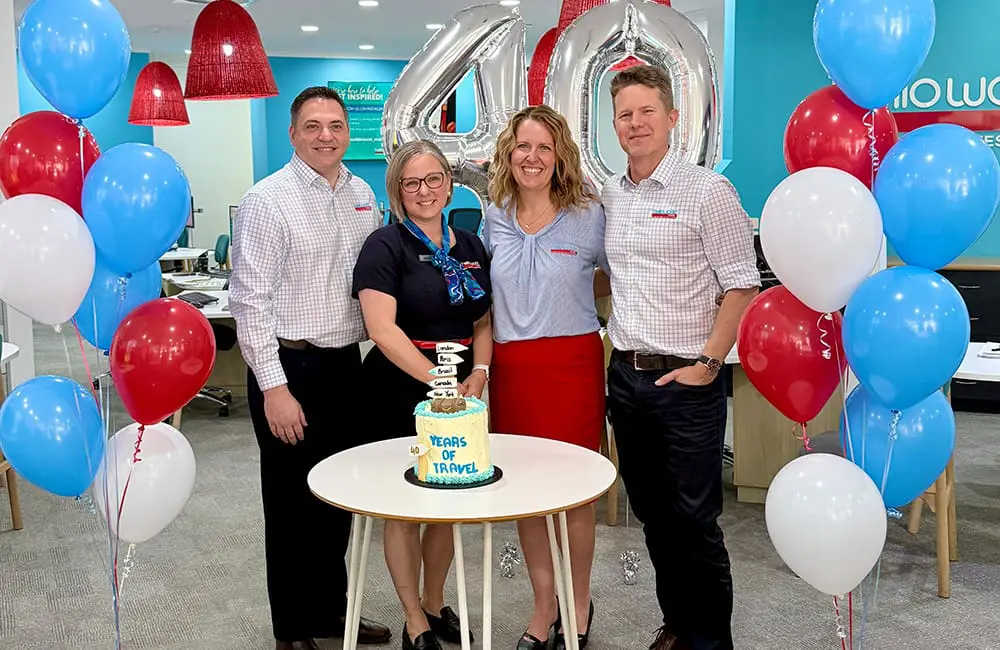 (L-R): Helloworld Travel Mackay Store Manager Matthew Perre, Helloworld Travel Mt Pleasant Store Manager Stacey Brownsey and agency owners Annabel and Ben Dolphin. 