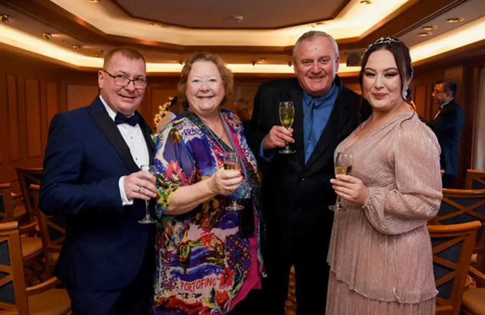 The Fishers (left) attended a crew wedding on board a Princess Cruises' World Cruise for Sebastian and Emilia.