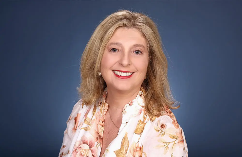 TIME takes off with Qantas partnership to back next-gen travel leaders 1 Corporate headshot of woman against blue background