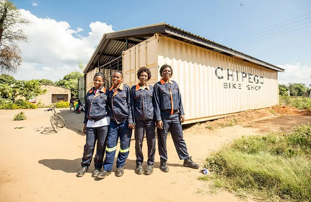 $3.3M raised, 550K lives changed: A&K Philanthropy achieves most impactful year yet 2 Women outside the Chipego Bike Shop in East Africa. Image: A&K Philanthropy