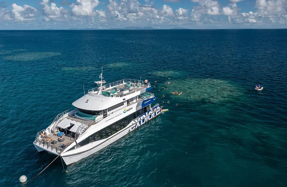 Ocean Explorer ship at Stepping Stones dive site, Bait Reef. Image: Explore Group Australia