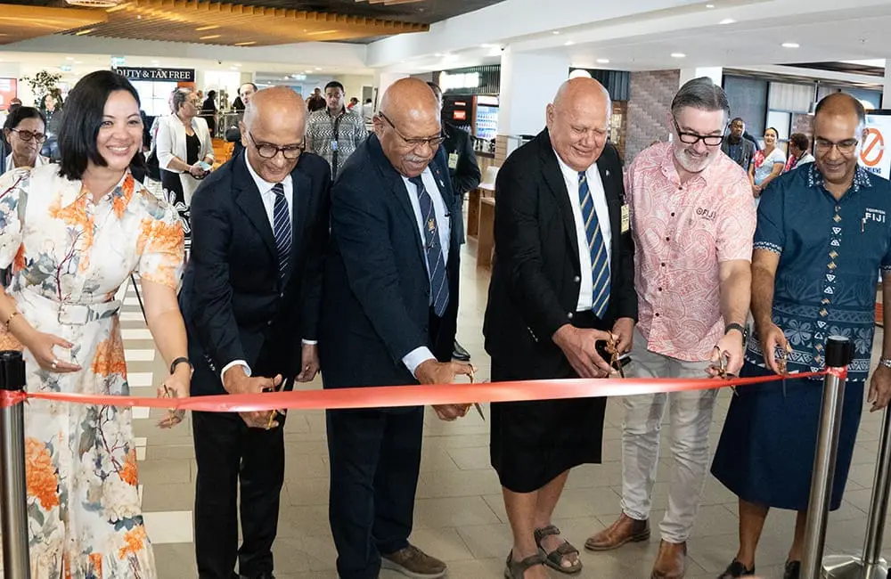 Ribbon cutting at Nadi International Airport for the inaugural NAN-OOL launch.