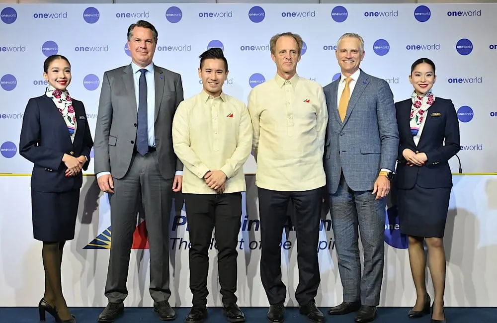 oneworld Chief Executive Officer Ole Orvér (2nd from left), PAL Holdings, Inc. President Lucio C. Tan III (3rd from left), Philippine Airlines President Richard Nuttall (3rd from right), and American Airlines Chief Executive Officer and Chairman of the oneworld Governing Board Robert Isom (2nd from right) during a press briefing in Rio de Janeiro, Brazil, on June 6, 2026, announcing Philippine Airlines’ entry into the oneworld Alliance.