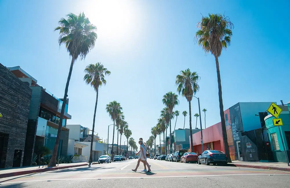 Fresh from LA: The hottest hotels, dining spots, events and attractions for 2026 10 Crossing Abbot Kinney Boulevard in LA's beach city of Venice Beach. Image: Los Angeles Tourism
