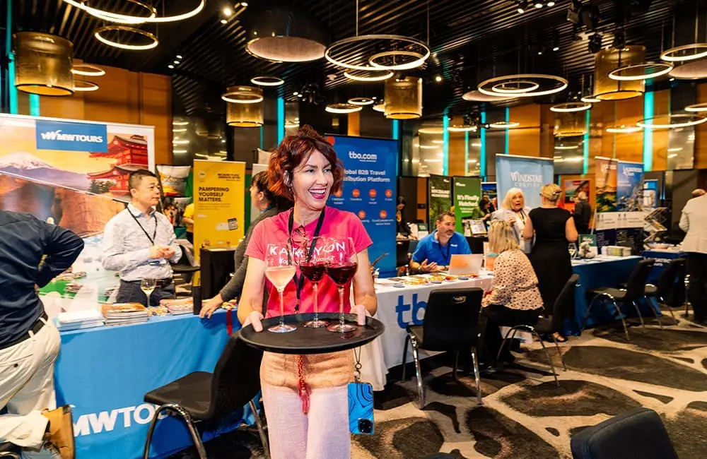 Karryon General Manager Dani Tuffield circulates on the marketplace floor with drinks at Niche is Nice 2025 in Brisbane
