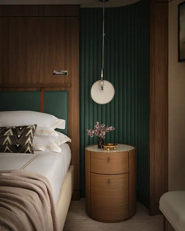 Wake up somewhere extraordinary: Oceania Cruises launches new collection with 50% reduced deposits 6 Close-up of bed in stateroom aboard Oceania Allura cruise ship.