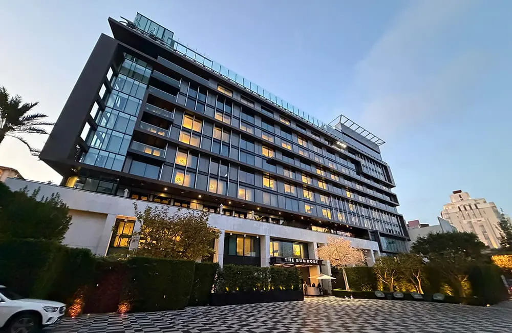 The Sun Rose West Hollywood hotel exterior lit up at dusk. Image: Cassie Tannenberg
