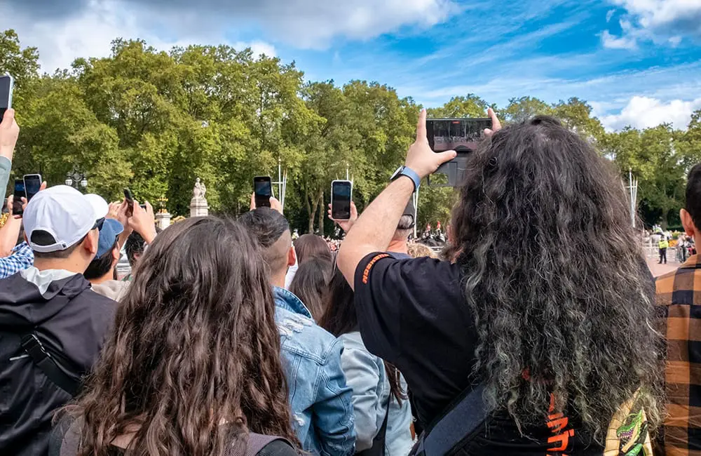 The Changing of the Guard Ceremony on The Mall in London is packed over the summer. Image: whitemay/iStock