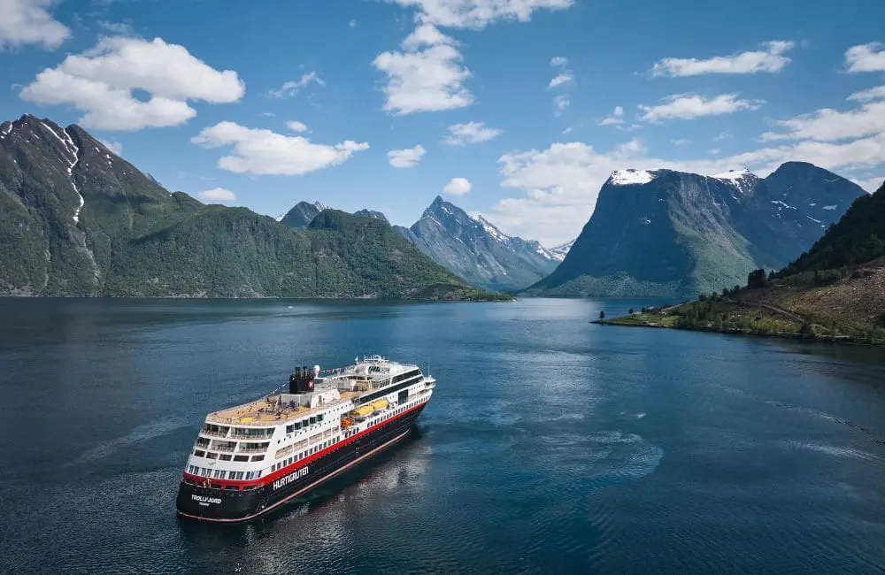 Hurtigruten APAC MD Damian Perry on the cruise line's expanded portfolio and goal to be emission-free 2 MS Trollfjord cruising the Norwegian Fjords in spring