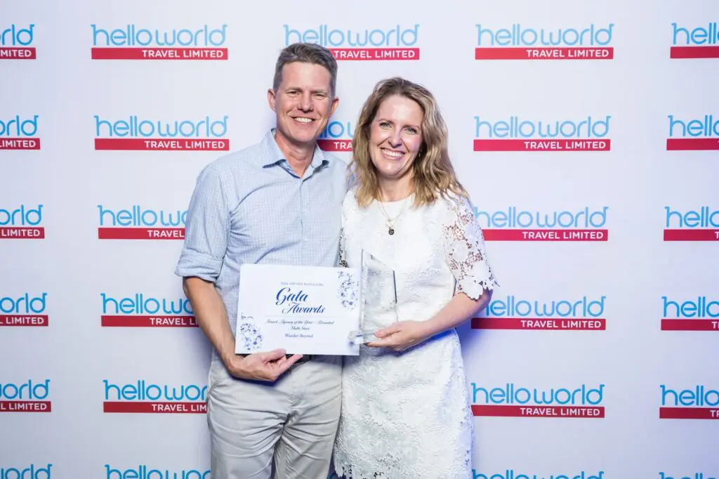 Helloworld Travel Mackay crowned Australia's best multi-store agency at OMC 2 (L-R) Ben and Annabel Dolphin, Helloworld Travel Mackay, Mt Pleasant and Willows Townsville