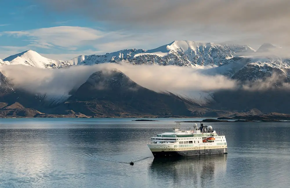 HX and University of Tasmania launch free Svalbard educational course for Aussie travellers 3 MS Fram expedition ship docked near the historic trappers' hut, Texas Bar, in Svalbard. Image: HX