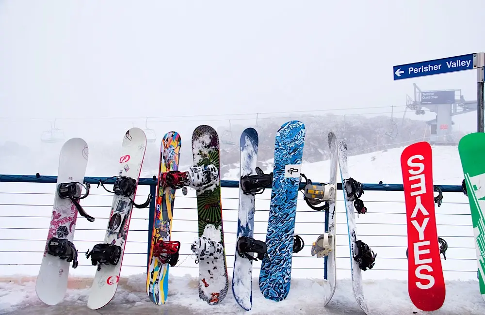 Snowboards lined up at Perisher Valley in NSW.